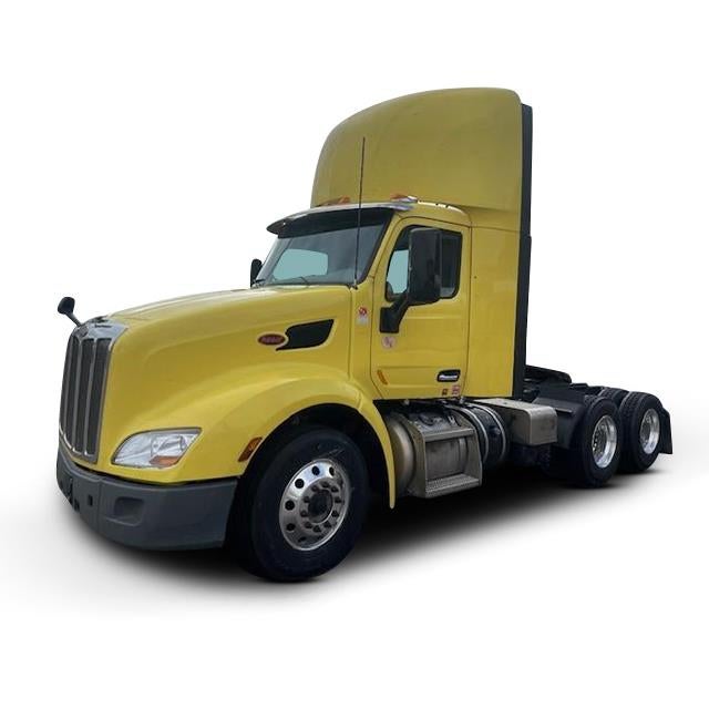 2021 Peterbilt 579 Base in Yellow — front three-quarter view